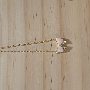 Elegant Pink and Gold Bow Necklace